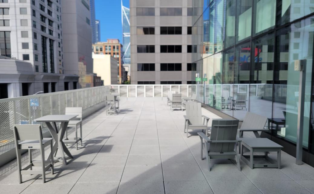 grey furniture on an outdoor terrace