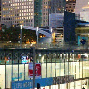 Moscone North on Howard Street with the city's skyline in the background.